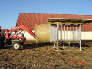 Customer Loading the Klene Pipe Hay Saver Hay Feeder